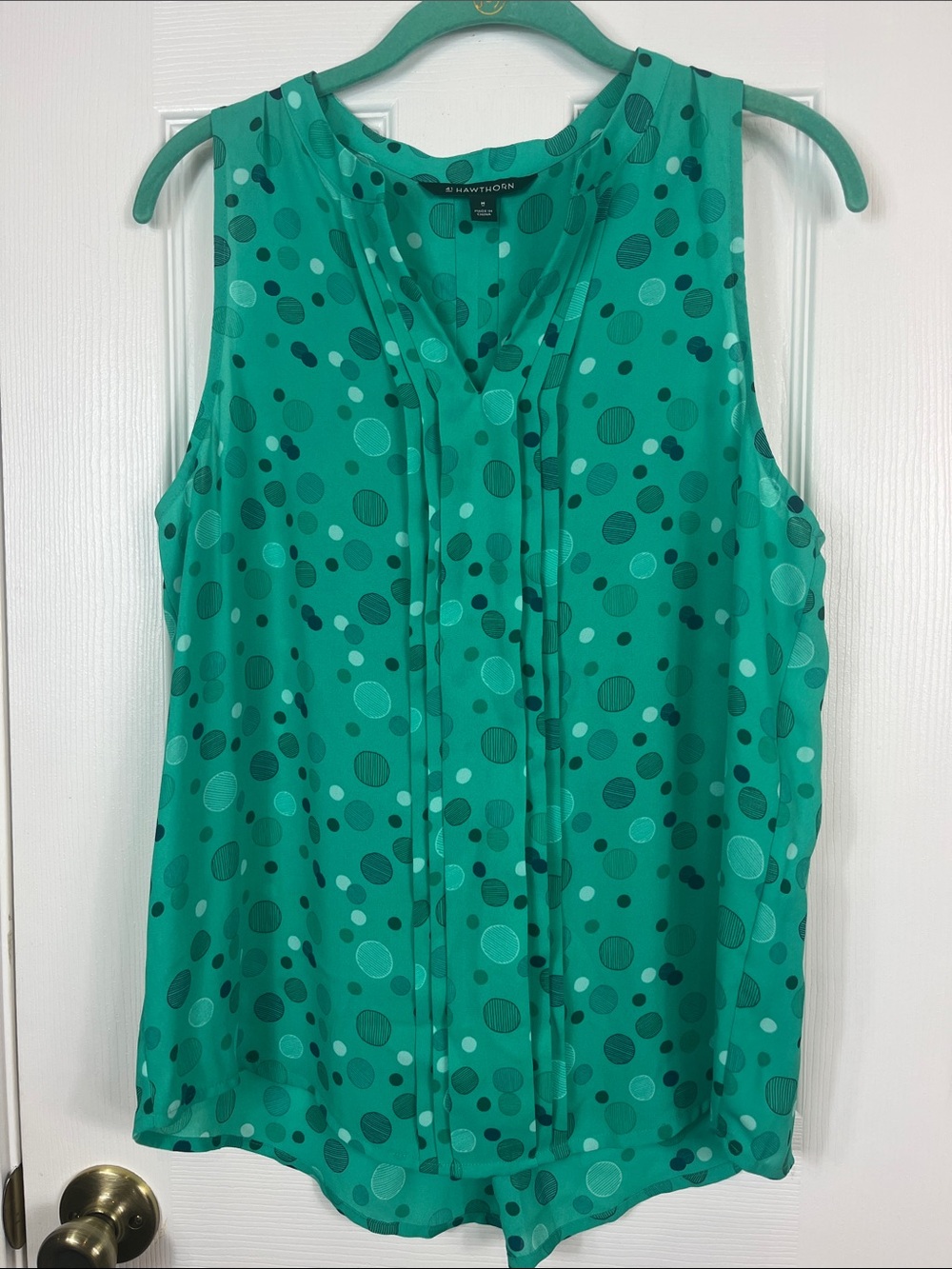 41 Hawthorn green sleeveless top size medium. Polka dots, ruffle down front